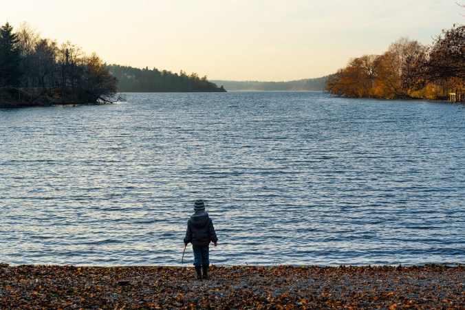 A visual of a person looking forward over a lake to indicate that God's mercy can transform our future. 